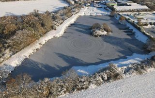 Aerial shot of main lake in winter